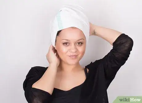 Image titled Wave Your Hair With a Flat Iron Step 1