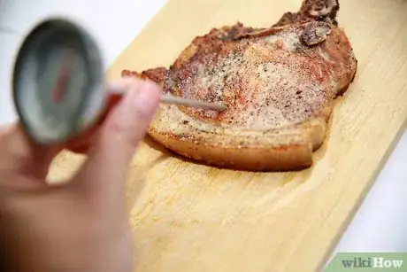 Image titled Tell if Pork Chops Are Done Step 6