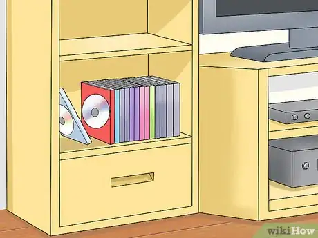 Image titled Decorate Entertainment Center Shelves Step 3
