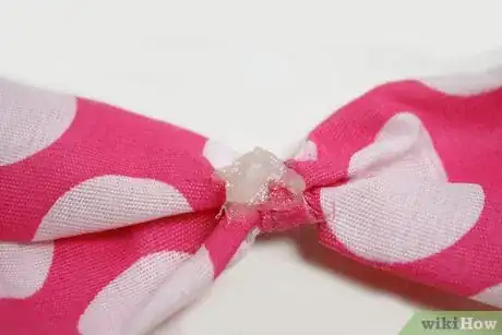 Image titled Put a Bow on a Baby Step 1