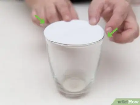 Image titled Make a Coin Disappear Step 4