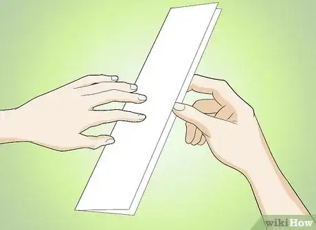 Image titled Make a Doll Book Step 3