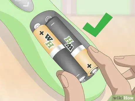 Image titled Put Batteries in Correctly Step 10