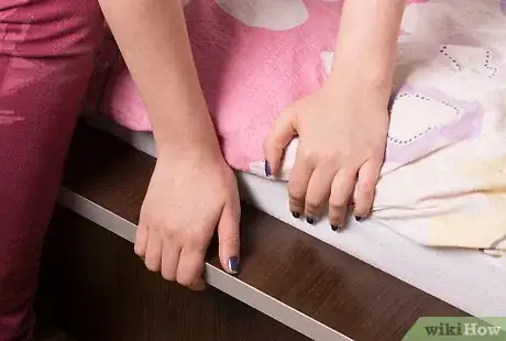 Image titled Escape from a Second Story Fire Step 7