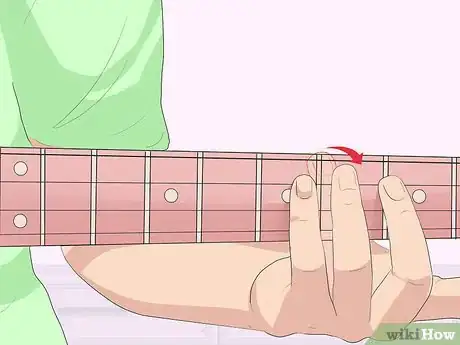 Image titled Play Harmonics on the Bass Guitar Step 4
