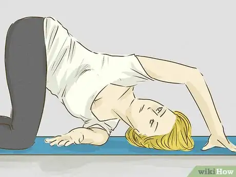 Image titled Do the Tabletop Twist Pose Step 9