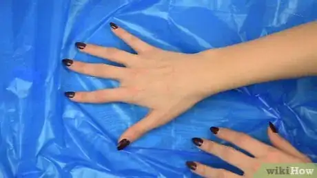 Image titled Create Faded Dyed Sneakers Step 1