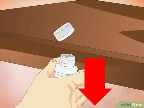 Image titled Open a Child Proof Pill Container Step 6