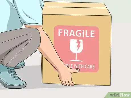 Image titled Protect Your Back While Moving Step 4