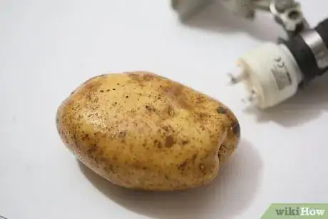 Image titled Remove a Broken Light Bulb with a Potato Step 2