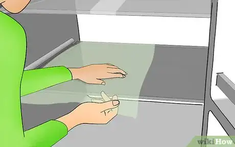 Image titled Cover Refrigerator Shelves in Plastic Wrap Step 7