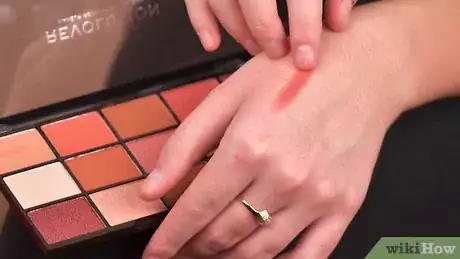Image titled Wear Peach Eye Shadow Step 4