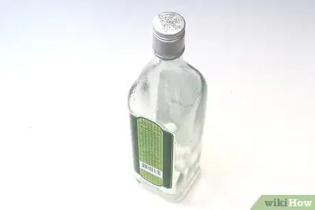 Image titled Turn Empty Glass Bottles Into Vases Step 1