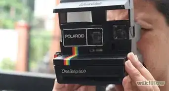 Load a Polaroid 600 Camera