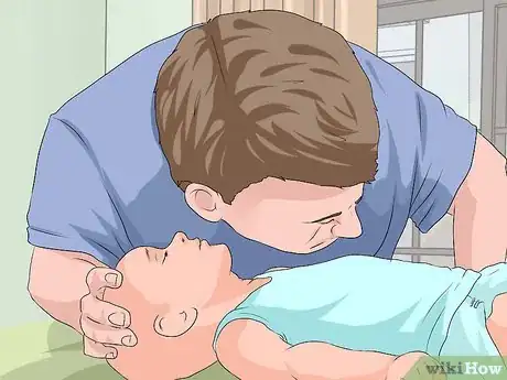 Image titled Treat an Unconscious Choking Adult or Child Step 1