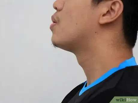 Image titled Relieve Lower Back Pain Through Stretching Step 12