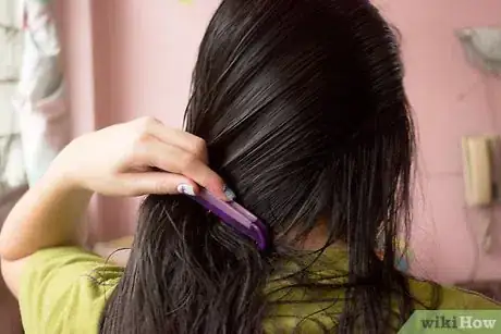 Image titled Straighten Hair with a Roller Brush Step 2