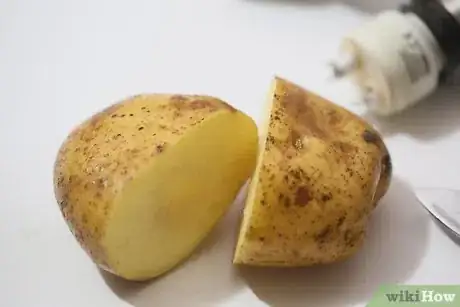 Image titled Remove a Broken Light Bulb with a Potato Step 3