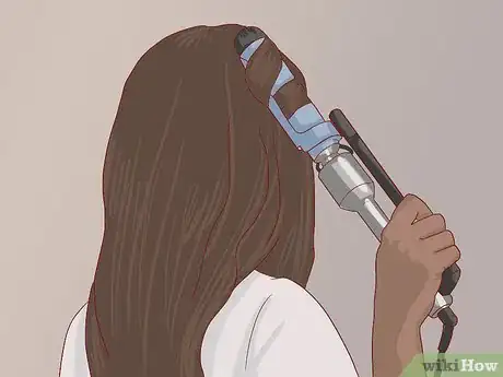 Image titled Make a Half‐Up Fishtail Ponytail Step 1