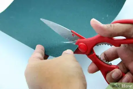 Image titled Sharpen a Knife With a Powerdrill and Sandpaper Step 2
