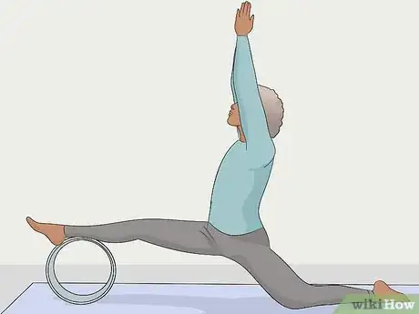 Image titled Use a Yoga Wheel Step 8