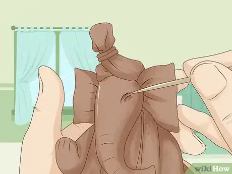 Image titled Decorate Ganesh Murti at Home Step 8.jpeg