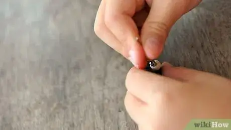 Image titled Tighten Your Wheels and Trucks on a Tech Deck Step 9