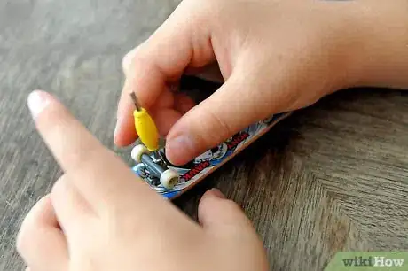 Image titled Tighten Your Wheels and Trucks on a Tech Deck Step 4