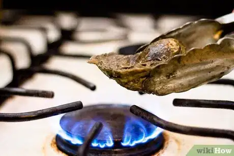 Image titled Open Oysters With Heat Step 3
