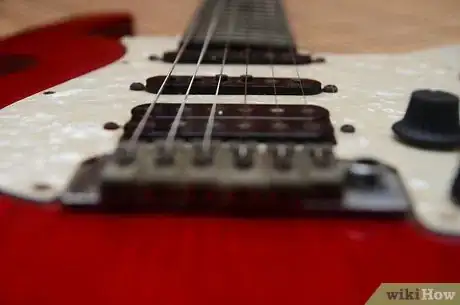 Image titled Make an Electric Guitar Into a Lap Steel Guitar Step 4