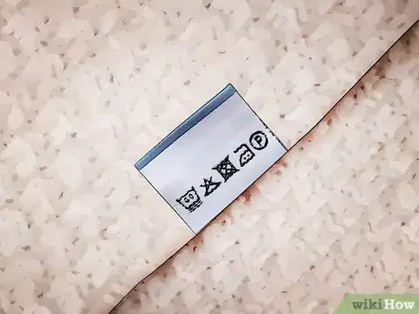 Image titled Prevent Sweaters from Stretching Step 1