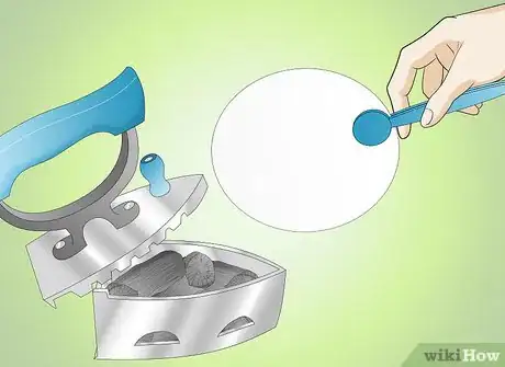 Image titled Use a Charcoal Iron Step 9