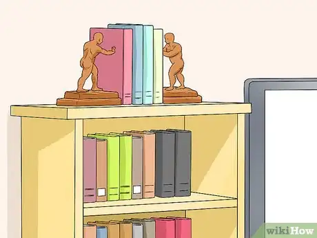 Image titled Decorate Entertainment Center Shelves Step 2