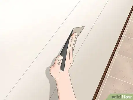 Image titled Prepare a Wall for Wallpaper Border Step 7
