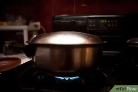 Image titled Stop Skin Forming on Milk Step 4