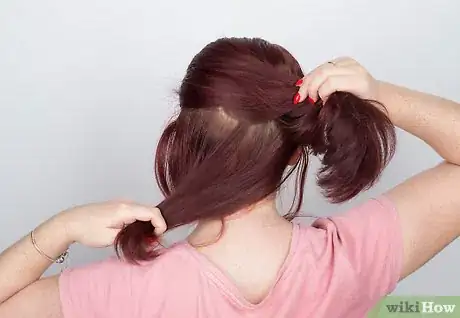 Image titled Curl Thick Hair With a Curling Iron Step 4