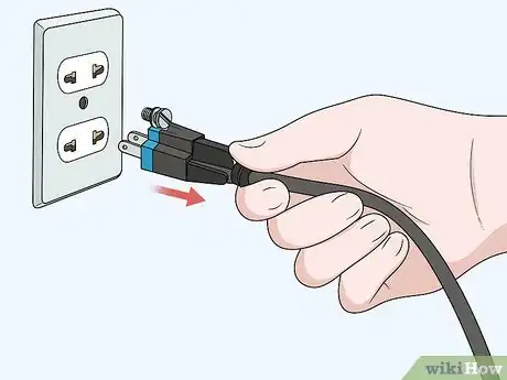 Image titled Adjust an Abrasive Stone on a Bench Grinder Step 1