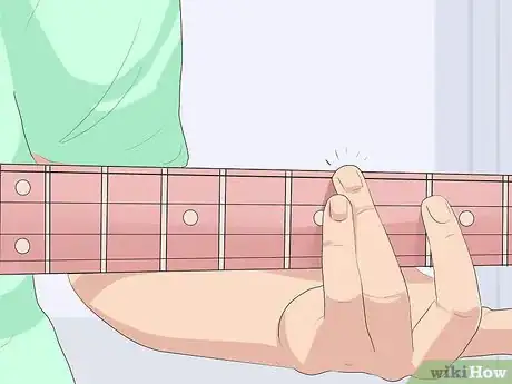 Image titled Play Harmonics on the Bass Guitar Step 2
