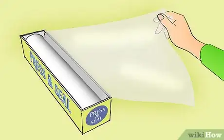 Image titled Cover Refrigerator Shelves in Plastic Wrap Step 5