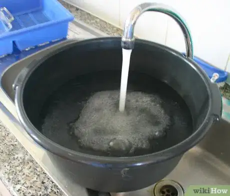 Image titled Fill bucket with water Step 2