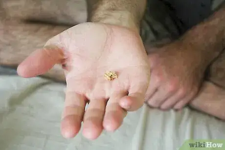 Image titled Catch Small Food Objects in Your Mouth Step 1