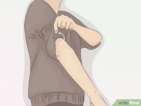 Image titled Roll Up Shirt Sleeves Step 19