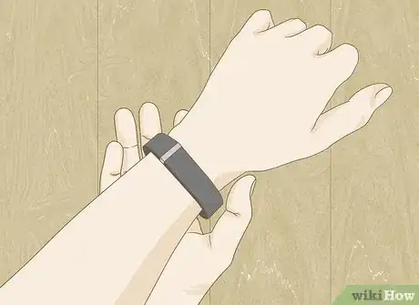 Image titled Use Your Fitbit to Monitor Your Sleep Step 1