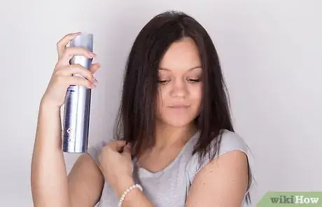 Image titled Get Shiny Hair While Using a Flat Iron Step 12