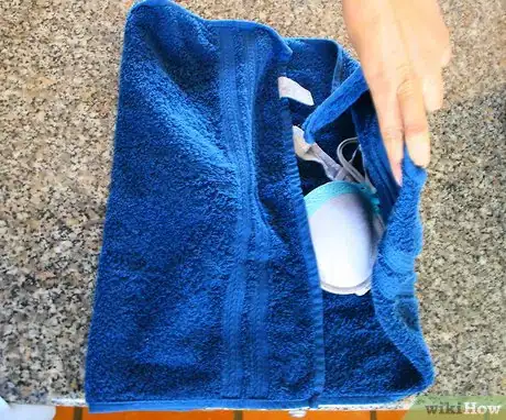 Image titled Fold towel over bra Step 8