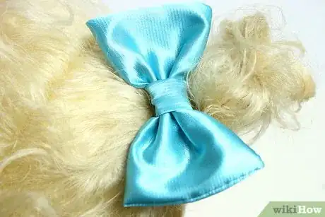 Image titled Put a Bow on a Baby Step 11