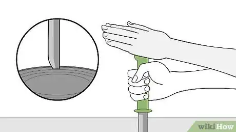 Image titled Open a Can Without a Can Opener Step 3
