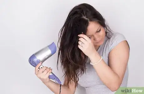 Image titled Get Shiny Hair While Using a Flat Iron Step 7