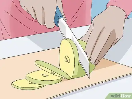 Image titled Prepare Fruit and Vegetables for Horses Step 5