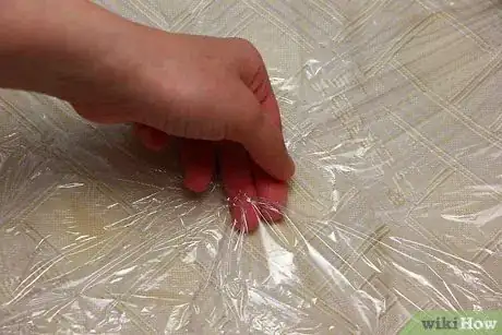 Image titled Use Hardware Store Plastic Sheeting as a Bedwetting Sheet Step 7